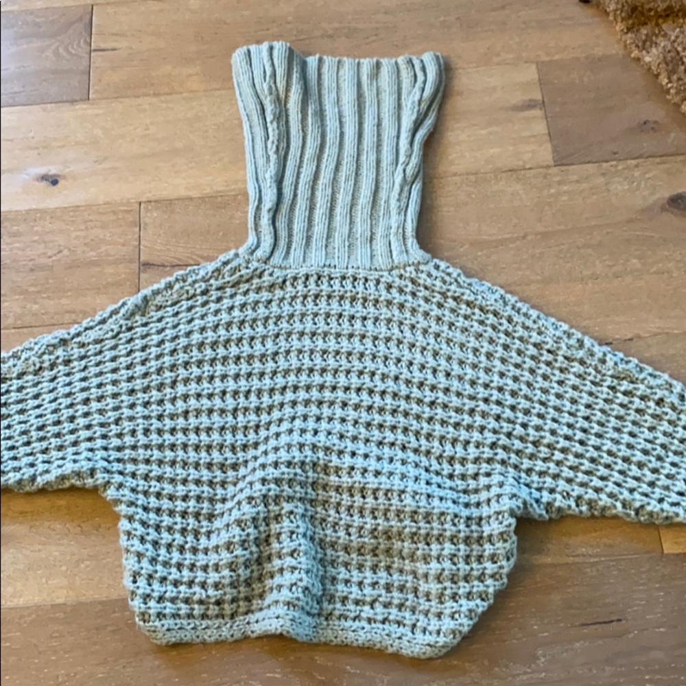 Cropped blue turtle neck sweater